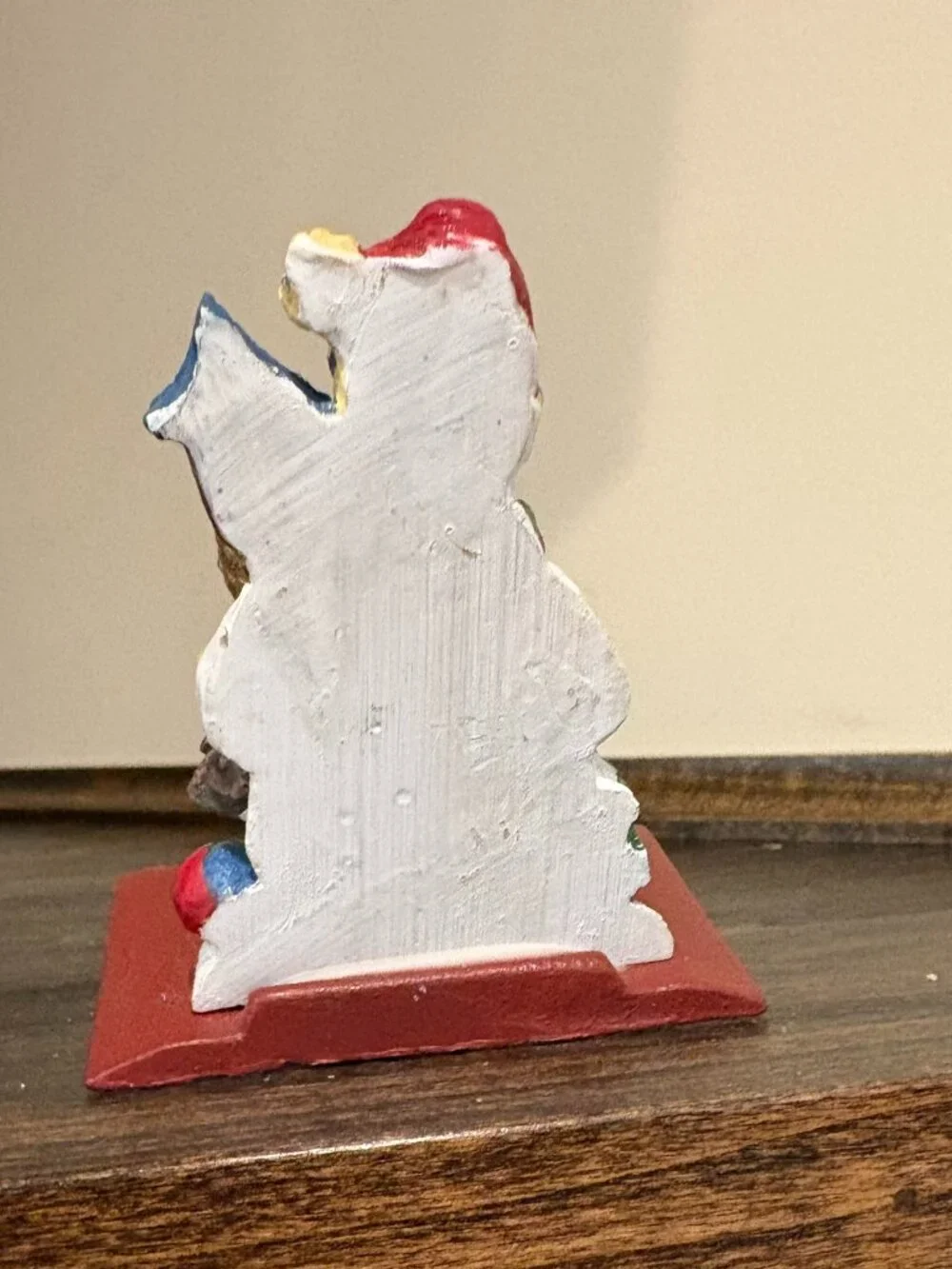 Vintage cast iron stocking holder, snowman with birdhouse, 3.5